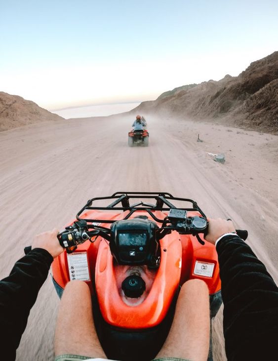 SUNRISE OR SUNSET QUADS IN THE DESERT IN SHARM